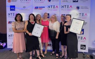 Group shot of Alana Kaye staff with their awards